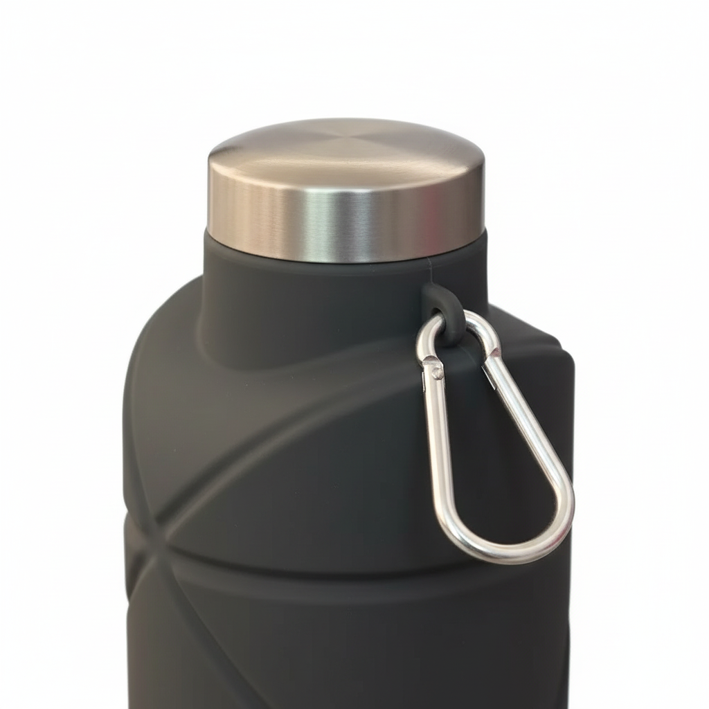 Close-up of the stainless steel cap and diamond-textured dark gray silicone body with carabiner on pure white background