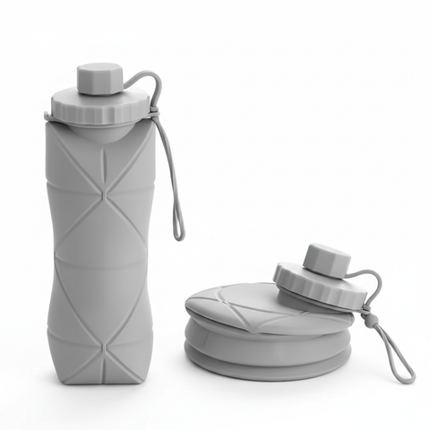 Gray 600 mL collapsible silicone water bottle shown folded beside its screw cap and carry loop