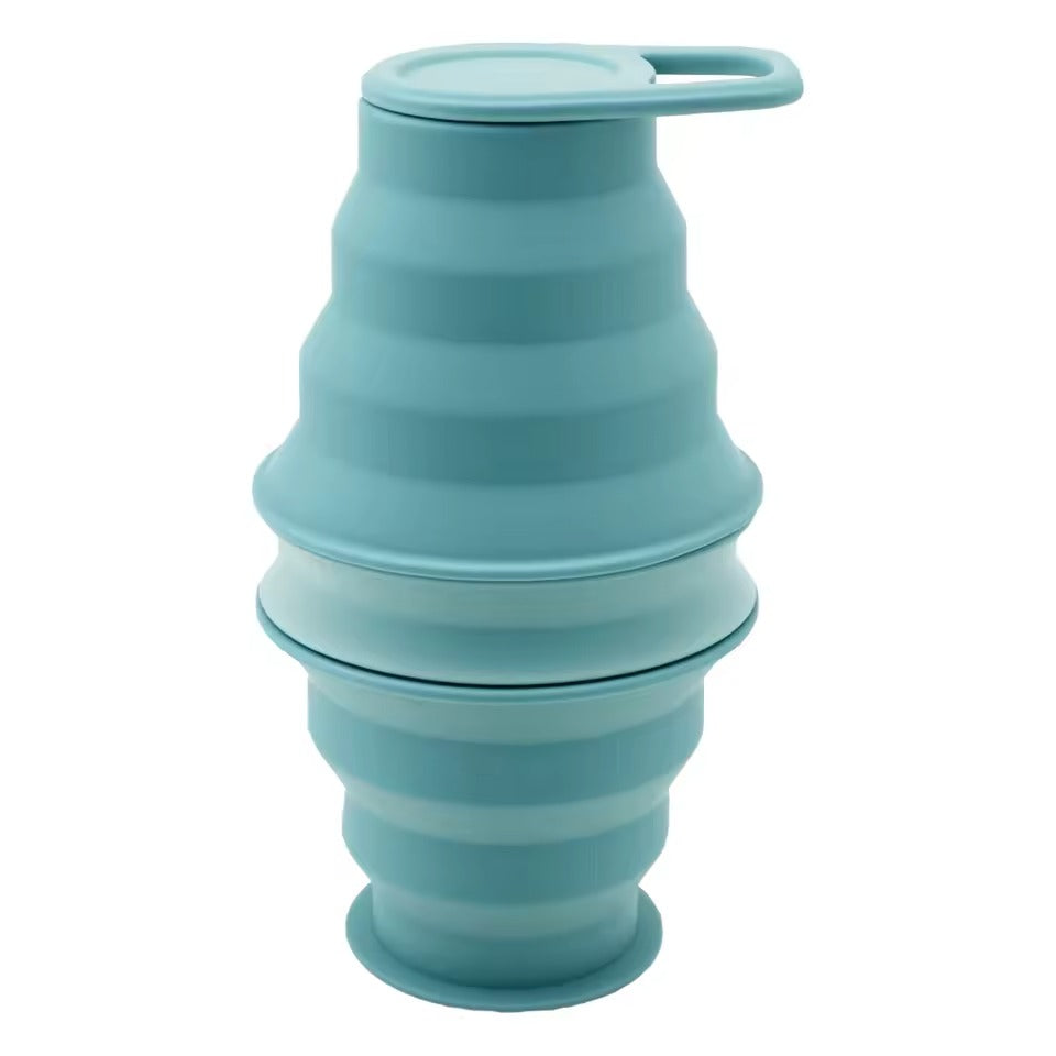 Mint 500ml collapsible silicone water bottle with leakproof carry-loop cap, on a white background