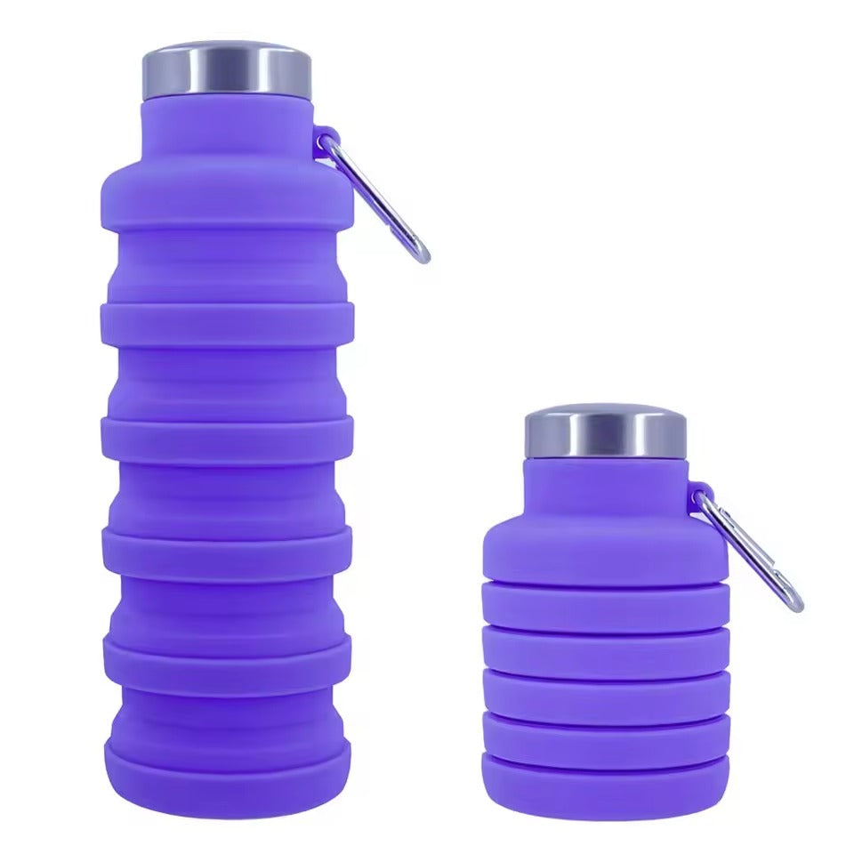 Purple 500ml collapsible silicone water bottle with stainless steel cap and carabiner, shown expanded and folded, on a white background