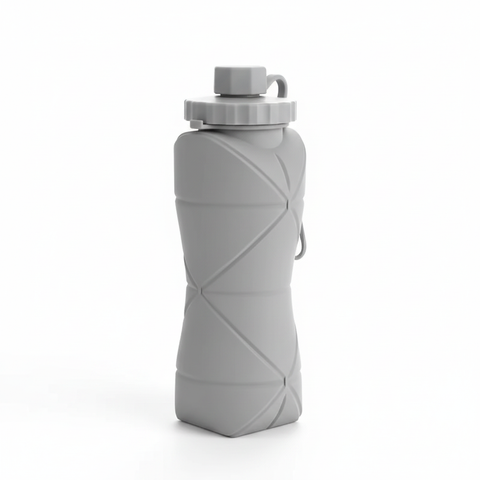 Three-quarter view of a gray 600 mL collapsible silicone water bottle with carry loop on a pure white background
